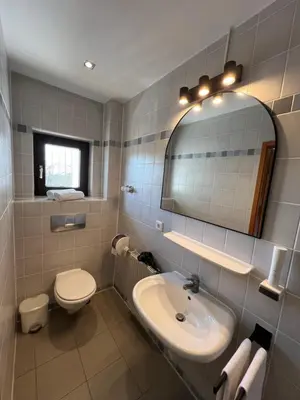 Ein Badezimmer in der Unterkunft Hotel Bastei