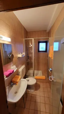 Ein Badezimmer in der Unterkunft La Locanda Ristorante Pizzeria Garni