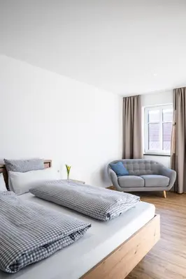 Ein Bett oder Betten in einem Zimmer der Unterkunft Kaneder Hof - Self Check-in