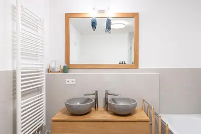 Ein Badezimmer in der Unterkunft LIBORIA: Stylisches Haus; Sauna ; 4min zum See