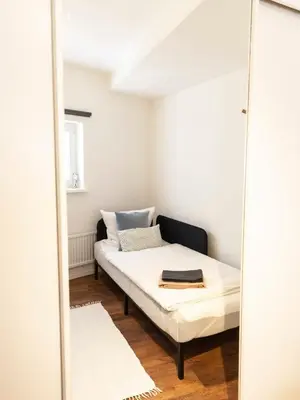Ein Bett oder Betten in einem Zimmer der Unterkunft Klimaneutrales Ferienhaus am idyllischen Ammersee