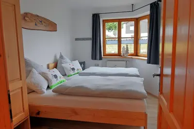 Ein Bett oder Betten in einem Zimmer der Unterkunft Ammervital - Apartments