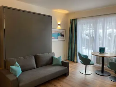 Ein Sitzbereich in der Unterkunft Ferienwohnung Spitzingsee Jagdhof