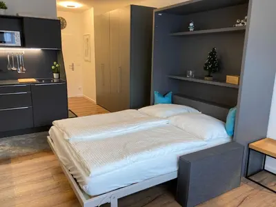 Ein Bett oder Betten in einem Zimmer der Unterkunft Ferienwohnung Spitzingsee Jagdhof