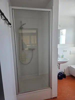 Ein Badezimmer in der Unterkunft Pension Messe