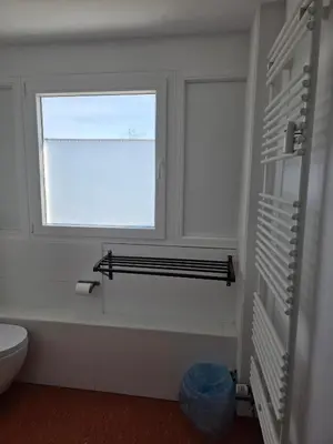 Ein Badezimmer in der Unterkunft Pension Messe