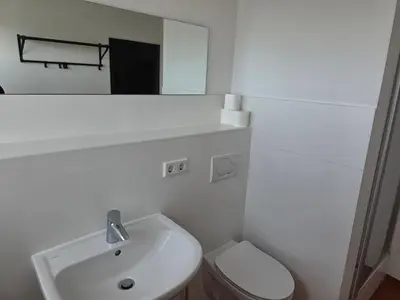 Ein Badezimmer in der Unterkunft Pension Messe