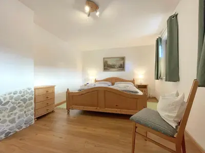 Ein Bett oder Betten in einem Zimmer der Unterkunft MittenDrin