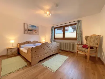 Ein Bett oder Betten in einem Zimmer der Unterkunft MittenDrin