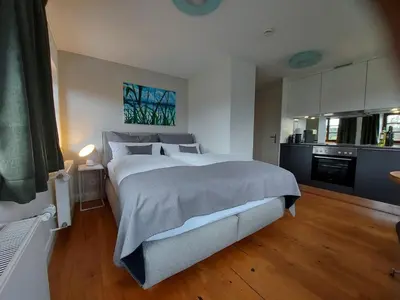 Ein Bett oder Betten in einem Zimmer der Unterkunft Tiny X im Marxhof Seebruck am Chiemsee