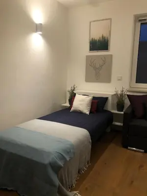 Ein Bett oder Betten in einem Zimmer der Unterkunft Berg-Hof