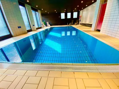 Der Swimmingpool an oder in der Nähe von Ferienwohnung Kranzhornblick - Alpenmagie Suites