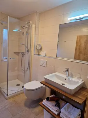 Ein Badezimmer in der Unterkunft Haus am Mühlenweg - Appartement 4 Haus I - sonniges und modernes Ferienappartement