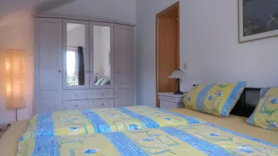 Ein Bett oder Betten in einem Zimmer der Unterkunft Ferienhaus Damberg
