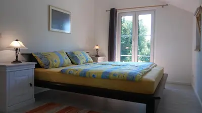 Ein Bett oder Betten in einem Zimmer der Unterkunft Ferienhaus Damberg