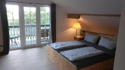 Ein Bett oder Betten in einem Zimmer der Unterkunft Ferienhaus Damberg