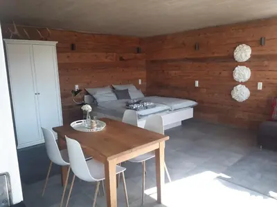 Ein Sitzbereich in der Unterkunft Chalet Buron