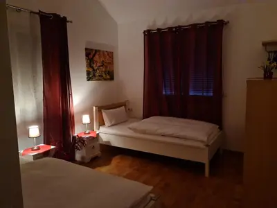 Ein Bett oder Betten in einem Zimmer der Unterkunft Apartment Gästehaus Staudenschloß