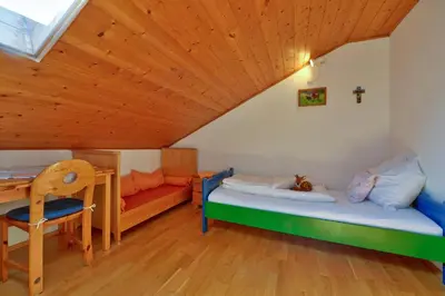 Ein Bett oder Betten in einem Zimmer der Unterkunft Gilg-Kräuterhof