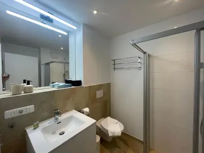 Ein Badezimmer in der Unterkunft City Lofts Tegernsee - Moderne Studios zentral gelegen