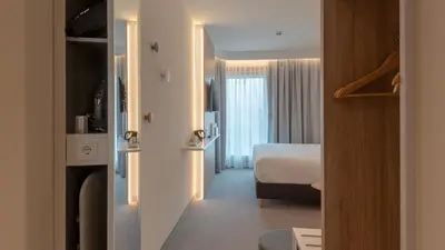 Ein Bett oder Betten in einem Zimmer der Unterkunft Holiday Inn Express - MUNICH NORTH by IHG