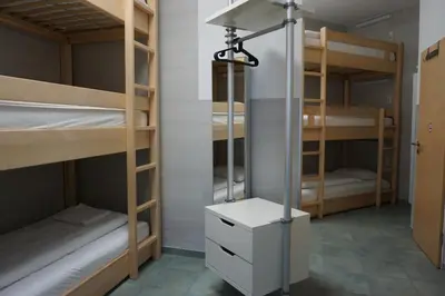 Ein Etagenbett oder Etagenbetten in einem Zimmer der Unterkunft Bett3de