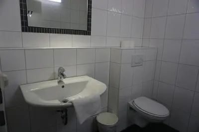Ein Badezimmer in der Unterkunft Bett3de
