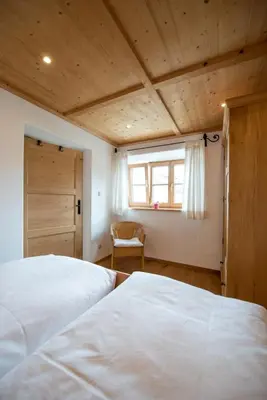 Ein Bett oder Betten in einem Zimmer der Unterkunft Ferienwohnung Lacherhof