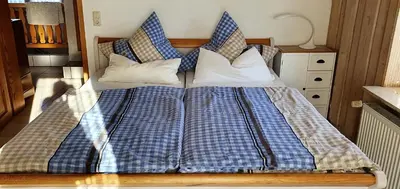 Ein Bett oder Betten in einem Zimmer der Unterkunft Ferienwohnung Ott Schongau