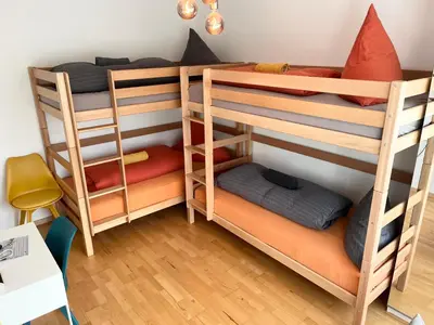 Ein Bett oder Betten in einem Zimmer der Unterkunft Gemütliche Privatzimmer mit geteiltem Bad, Küche und Garten