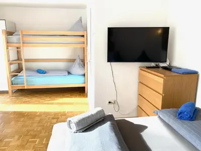 Ein Bett oder Betten in einem Zimmer der Unterkunft Gemütliche Privatzimmer mit geteiltem Bad, Küche und Garten