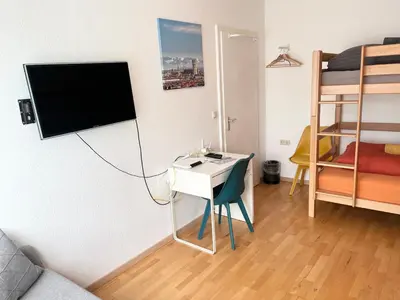Ein Bett oder Betten in einem Zimmer der Unterkunft Gemütliche Privatzimmer mit geteiltem Bad, Küche und Garten