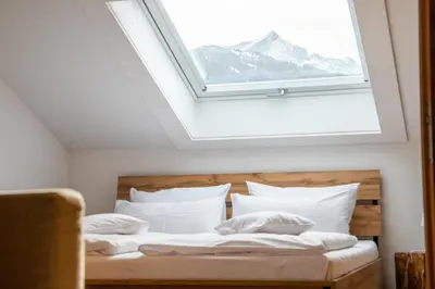 Ein Bett oder Betten in einem Zimmer der Unterkunft Jubigrat