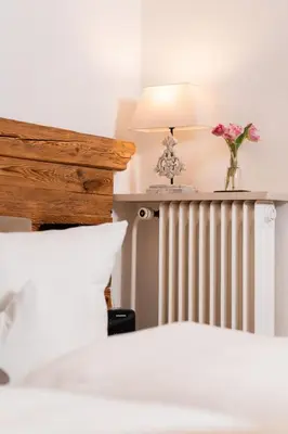 Ein Bett oder Betten in einem Zimmer der Unterkunft Hotel garni Reiffenstuel