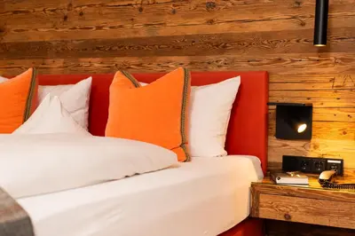 Ein Bett oder Betten in einem Zimmer der Unterkunft Hotel garni Reiffenstuel