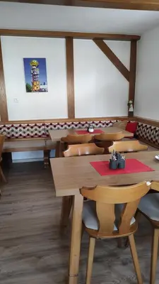 Ein Restaurant oder anderes Speiselokal in der Unterkunft Pension Schneider, Bad Gögging