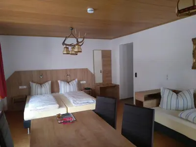 Ein Bett oder Betten in einem Zimmer der Unterkunft Pension Schneider, Bad Gögging