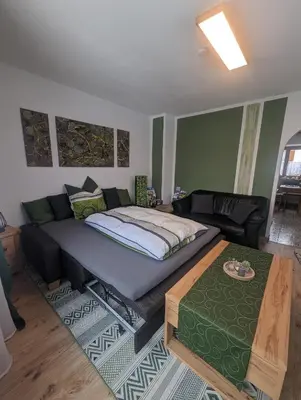 Ein Bett oder Betten in einem Zimmer der Unterkunft Ferienwohnung Walter Gluche