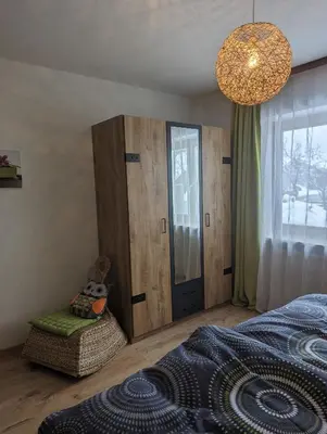 Ein Bett oder Betten in einem Zimmer der Unterkunft Ferienwohnung Walter Gluche