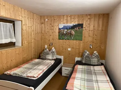 Ein Bett oder Betten in einem Zimmer der Unterkunft Großzügiges Domizil, 90qm, mit Terrasse, Garten, Infrarotkabine und Garage