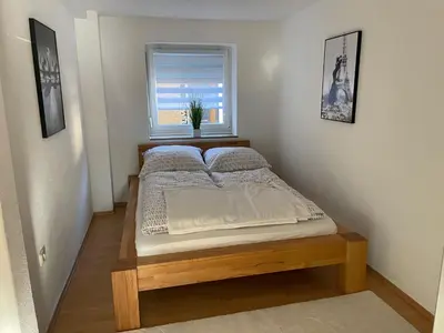 Ein Bett oder Betten in einem Zimmer der Unterkunft D&D Apartment