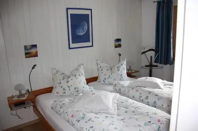 Ein Bett oder Betten in einem Zimmer der Unterkunft Ferienwohnung Schauberger