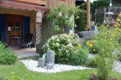 Ein Garten an der Unterkunft Ferienwohnung Schauberger