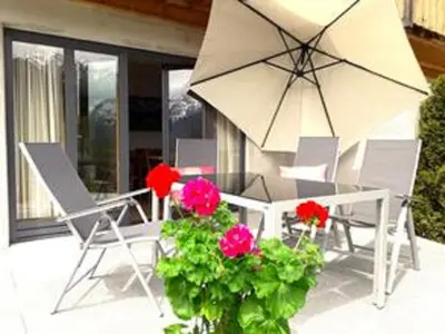 Ein Garten an der Unterkunft Haus Berglust Wallgau