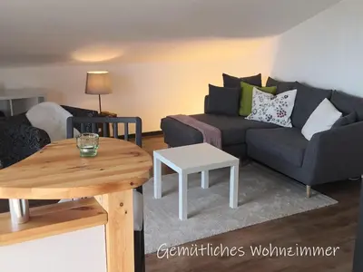 Ein Sitzbereich in der Unterkunft Beste Zeit Ferienwohnung