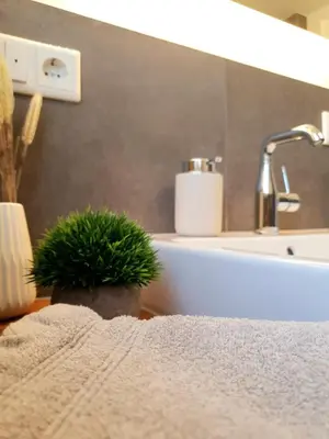 Ein Badezimmer in der Unterkunft Ferienhaus Berger mit eigenen Whirlpool im Garten