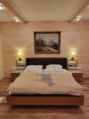 Ein Bett oder Betten in einem Zimmer der Unterkunft Golden GaPa Central Chalet Apartment 32