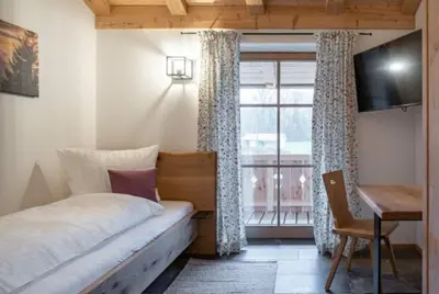 Ein Bett oder Betten in einem Zimmer der Unterkunft Landhaus Hutter