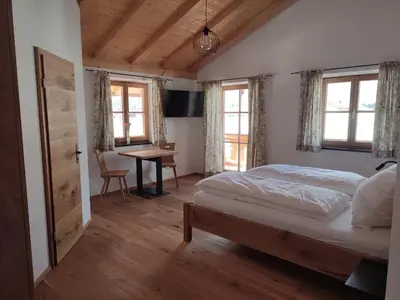Ein Bett oder Betten in einem Zimmer der Unterkunft Landhaus Hutter