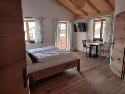 Ein Bett oder Betten in einem Zimmer der Unterkunft Landhaus Hutter
